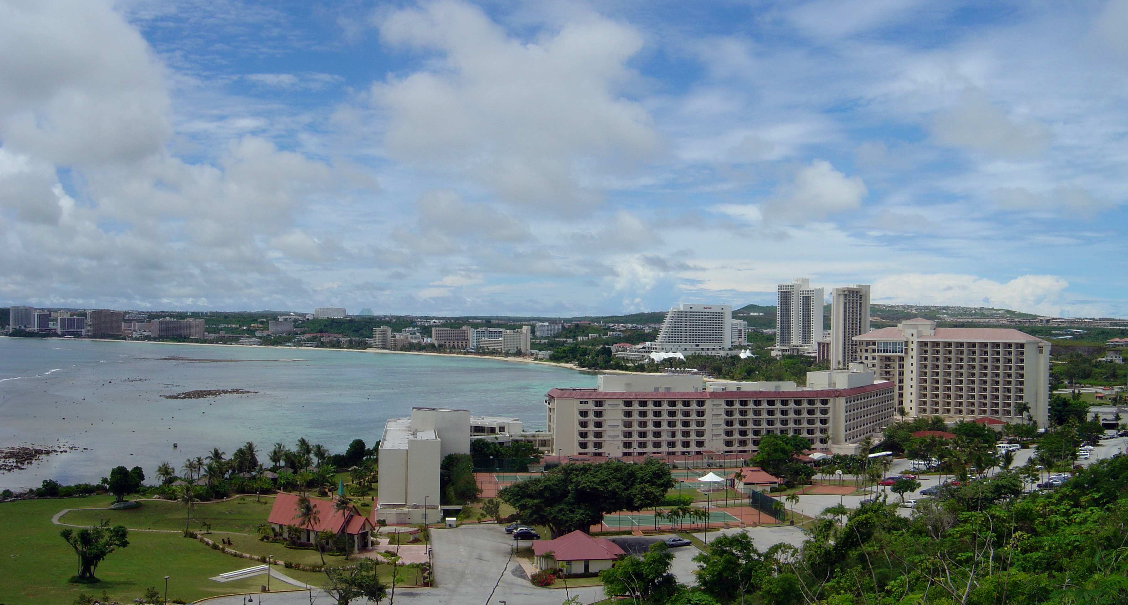 Coral reef systems are sensitive to impacts from urban coastal development and are declining in many regions. This photo, courtesy of NOAA, shows urban development near Guam’s coral reefs.